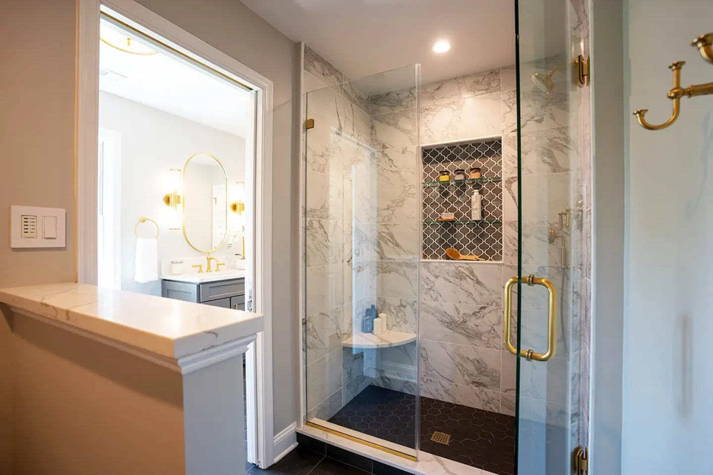 Glass shower room and narrow passage in Lower Gwynedd Primary Bathroom