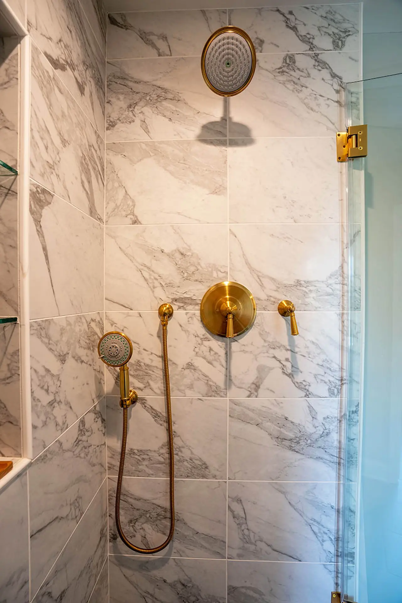 Gold Colored Shower Set in Lower Gwynedd Primary Bath Remodeled by Custom Craft