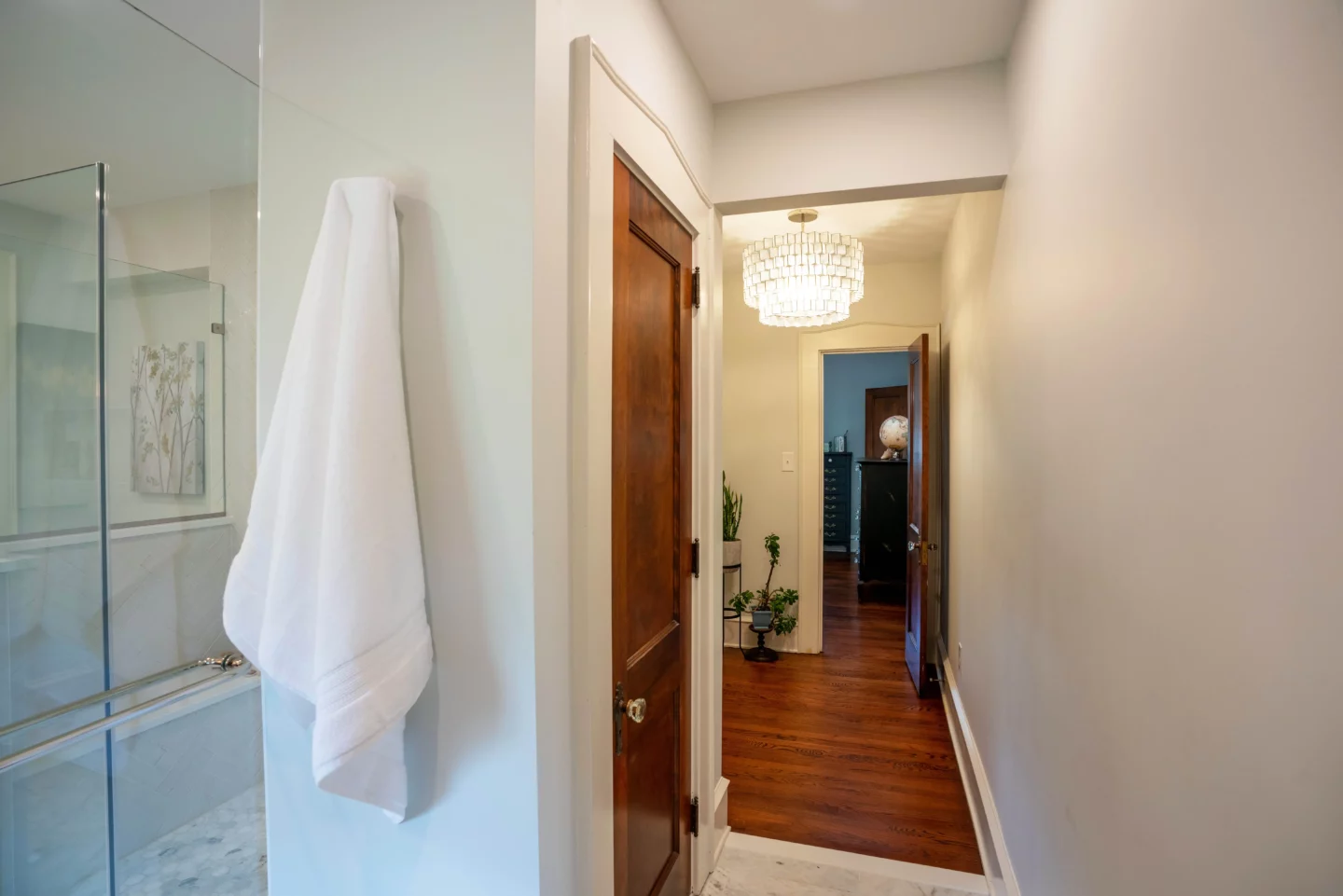 Corridor connecting the walk-in closet and shower area in Lansdale bathroom remodel