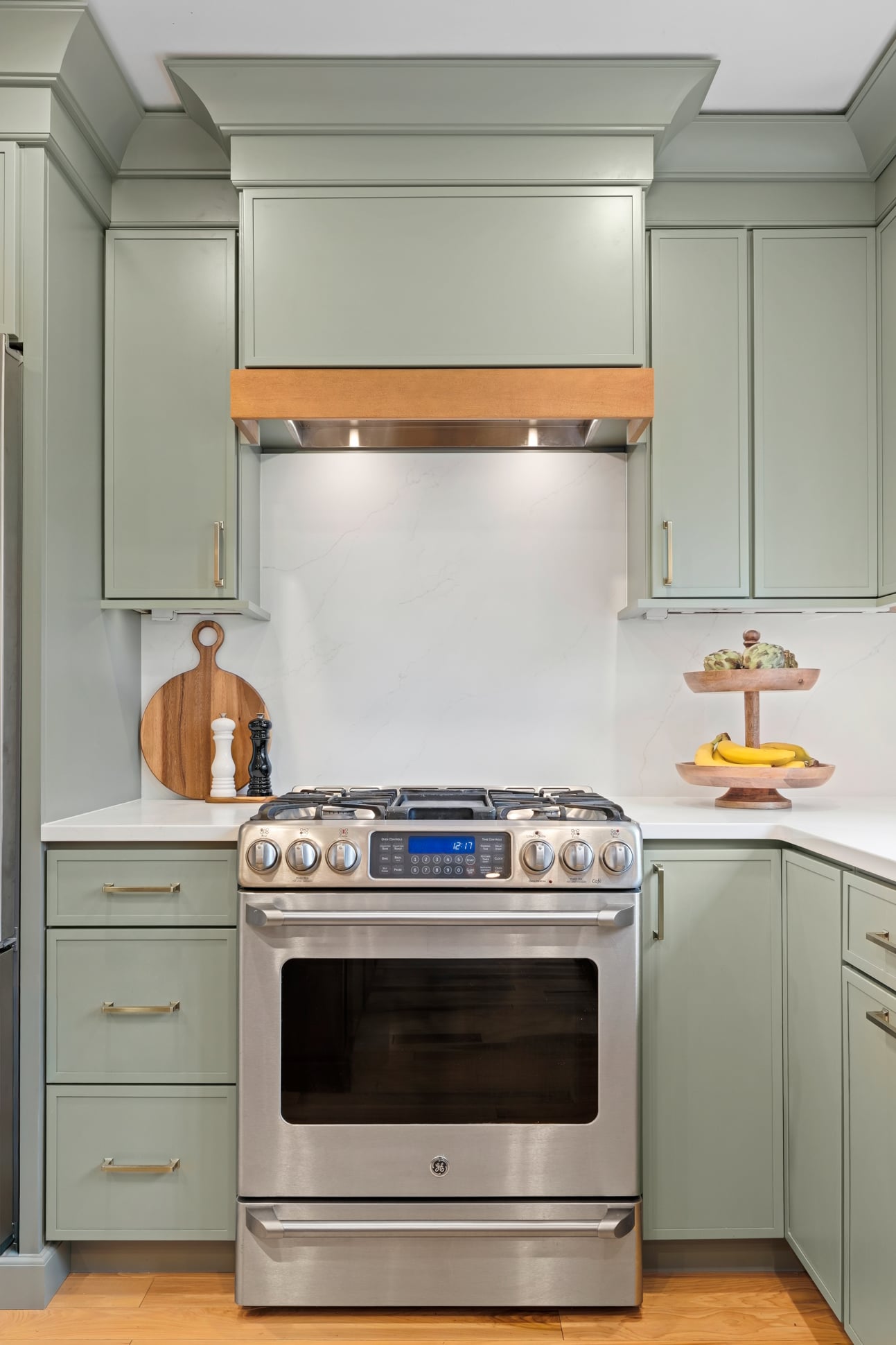 Marble kitchen backsplash with subtle veining and clean, timeless finish