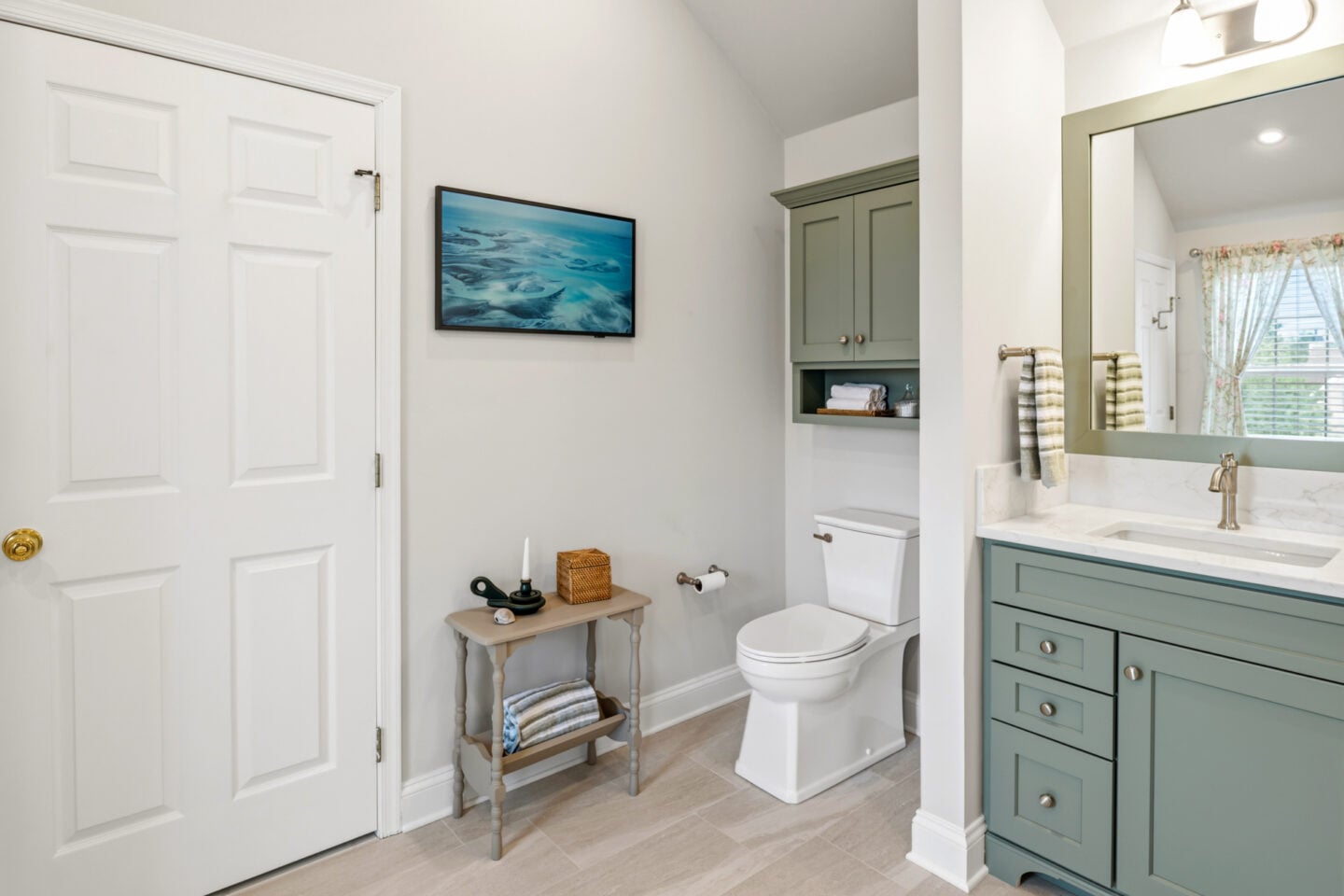 remodel-overview.jpg Wide view of a remodeled primary bathroom featuring a spacious layout, custom vanity, and walk-in shower in Harleysville.