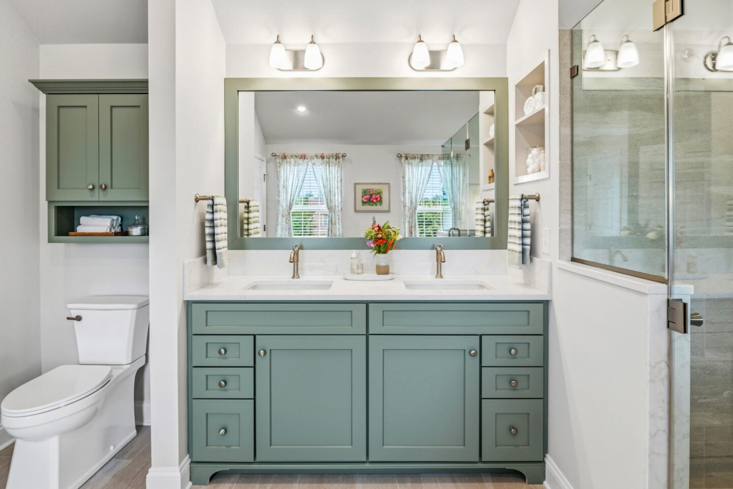 Calacatta Fioressa quartz countertop with custom vanity and brushed nickel faucet in a Harleysville bathroom remodel.