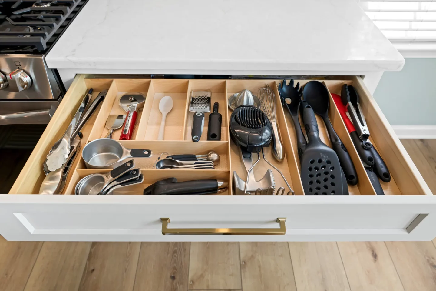 Organized utensil drawer in the island of the remodeled Lansdale kitchen