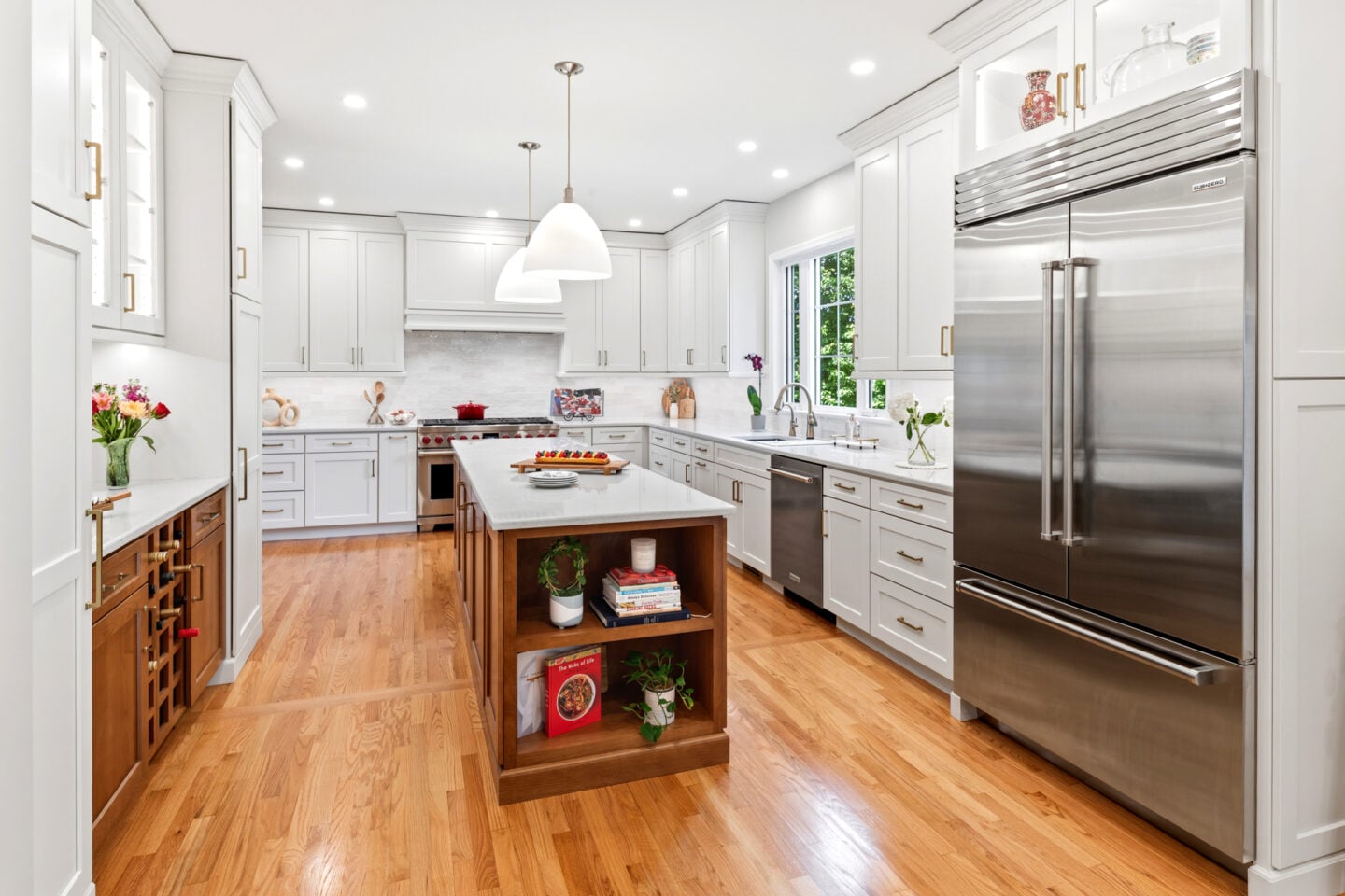 Large kitchen island with storage on all sides in a North Wales kitchen renovation